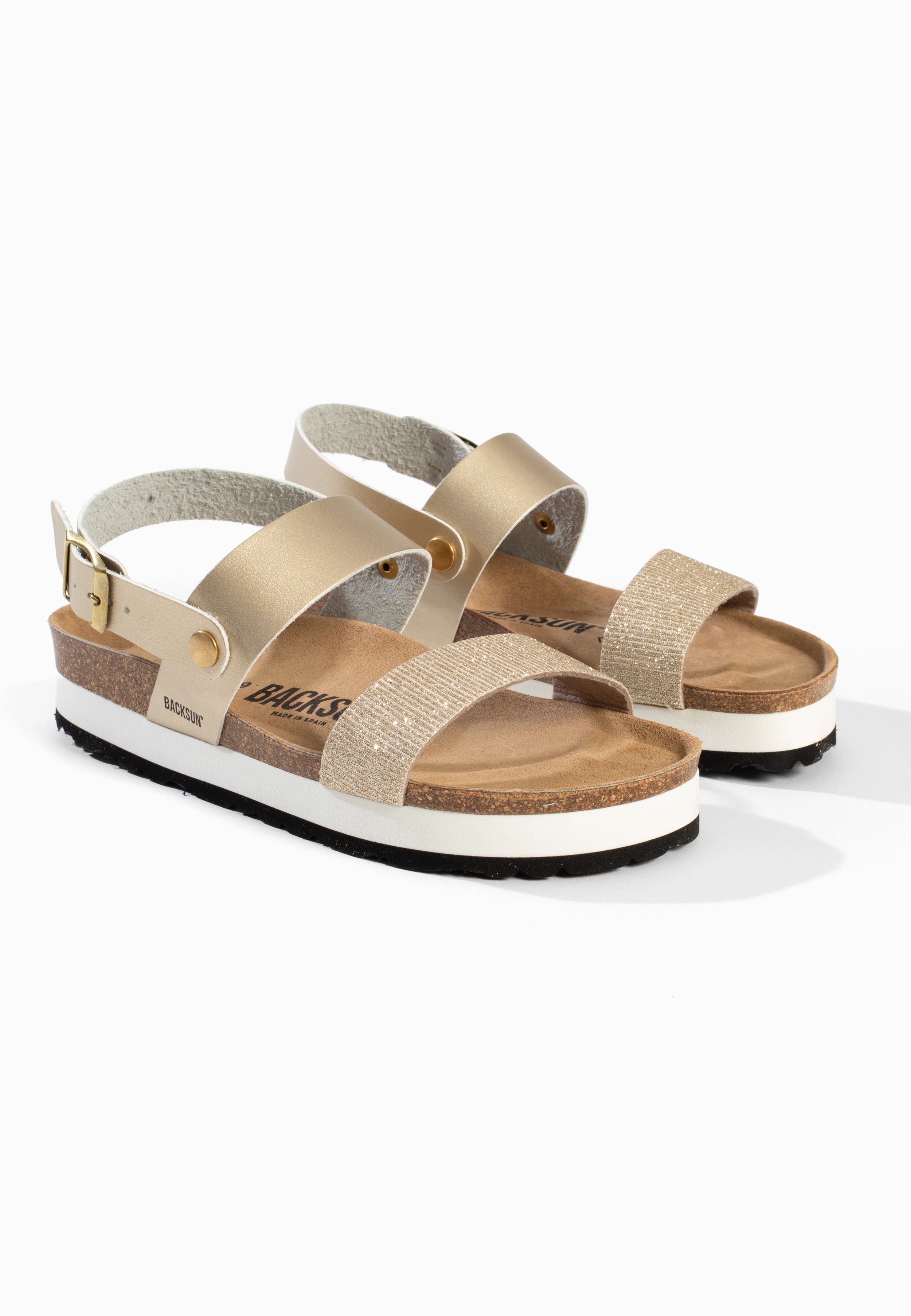 Gaias Plateausandalen in Gold und Platin